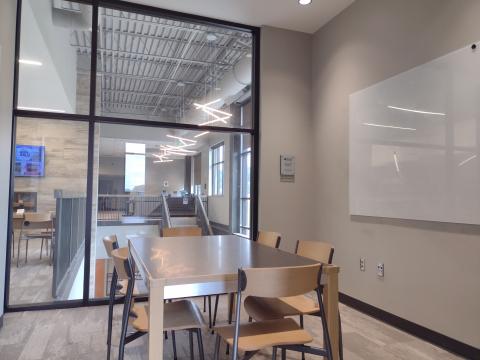 Conference room with rectangular table and 6 chairs