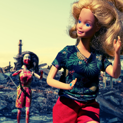 A normal Barbie runs away from an undead Barbie