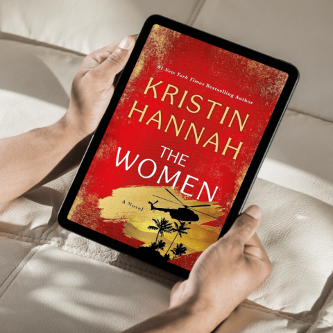 Person looks at ipad.