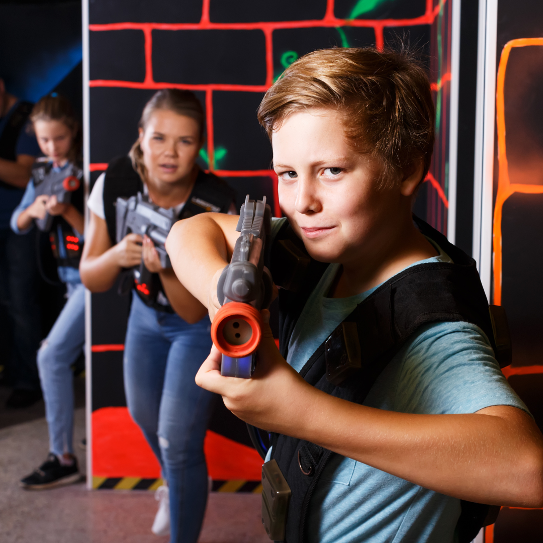 Photo of teens playing laser tag